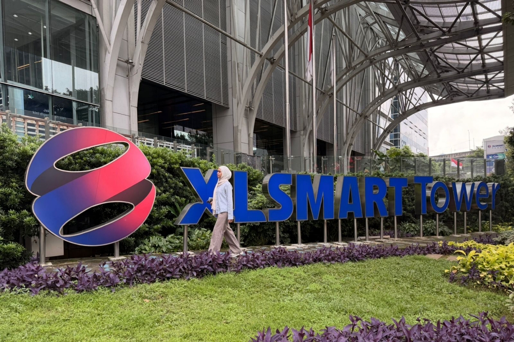 Lompatan Berani Pasca Merger, XLSMART Tebar Harapan Keberlanjutan, Raih Rating 2 Sustainable Fitch